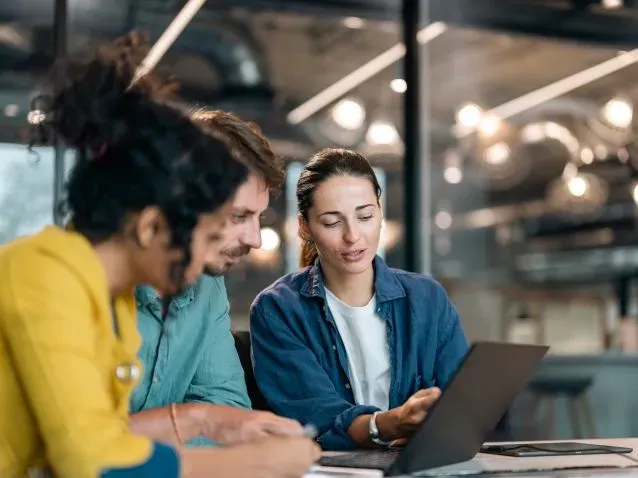 Professionals discussing Salesforce integration strategy.