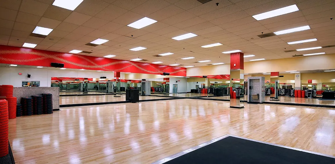 A fitness space showcasing premium stationary cycles and stair machines, designed for high-intensity endurance training.